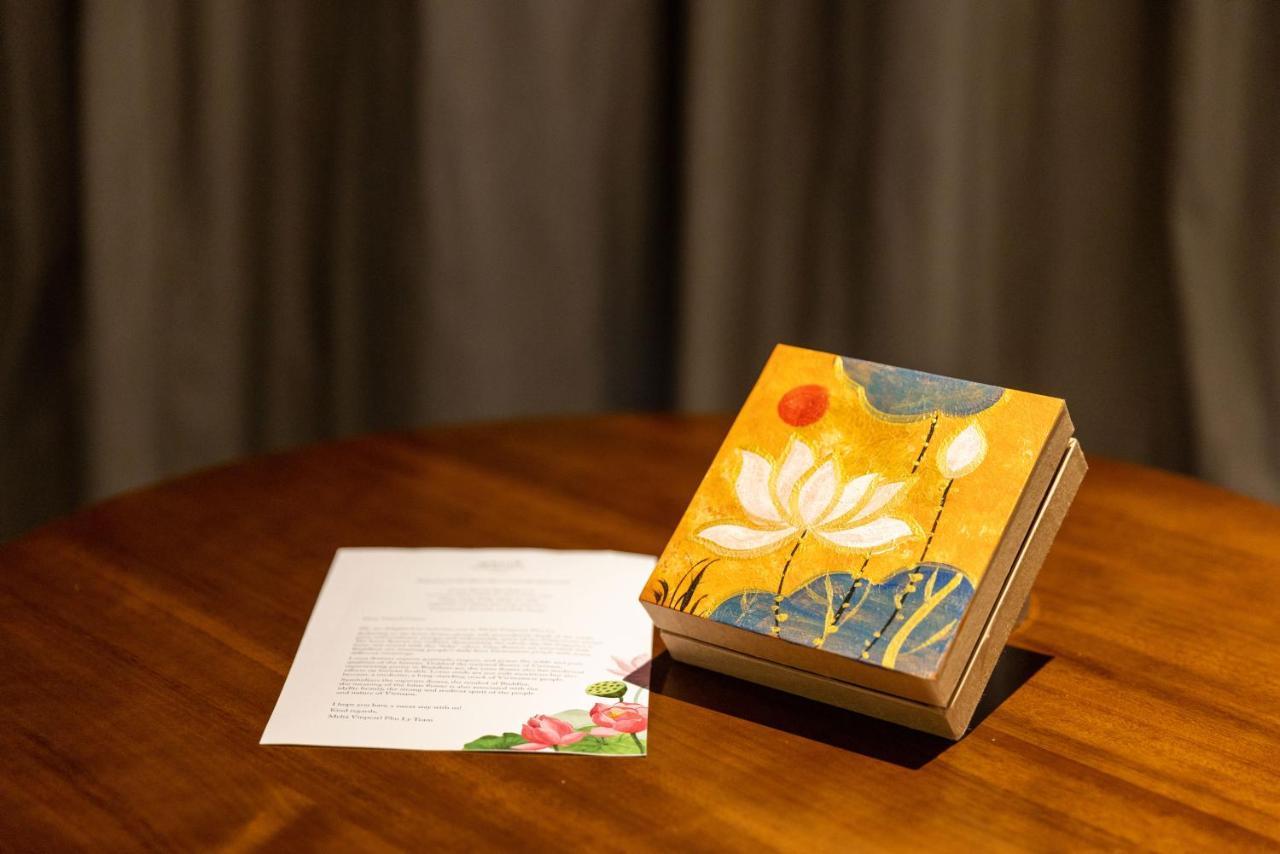 Melia Vinpearl Hue Hotel Kültér fotó A copy of the 2018 edition of the Book of Mormon